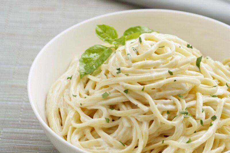 Italian pasta dinner — fresh linguine with basil