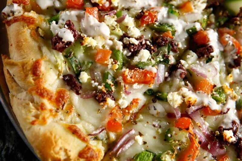 Big Fat Greek Pizza with feta, olives, tomatoes, and fresh veggies