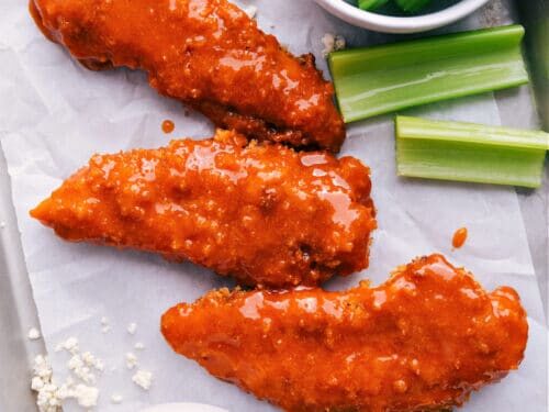 Crispy buffalo wings with celery and blue cheese dipping sauce